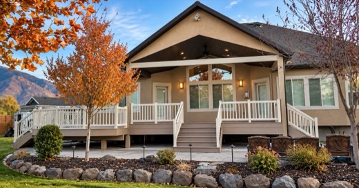 Gable porch roof over a Trex Transcend deck on a craftsman home in autumn