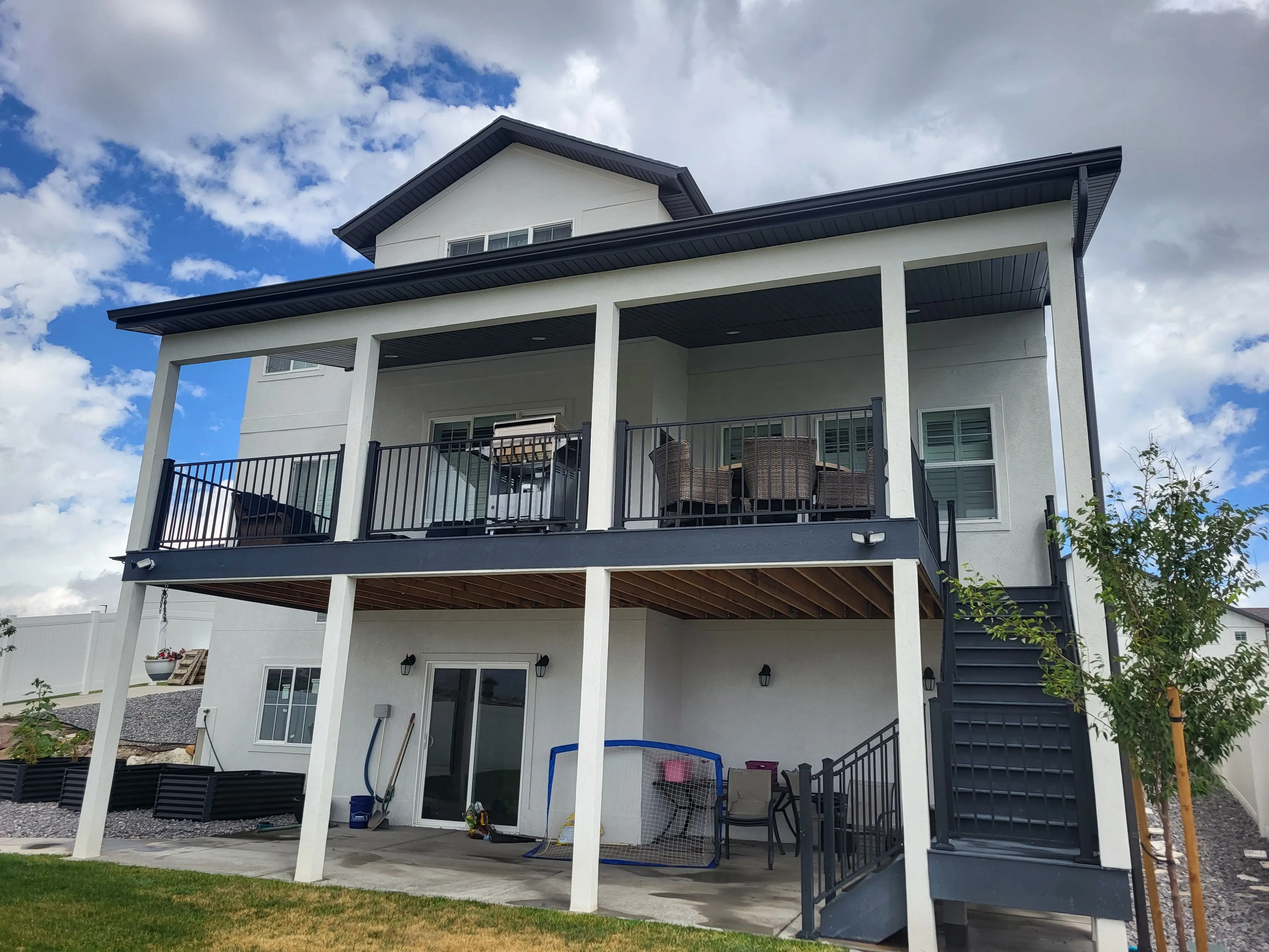 Custom Shed Roof Transform an outdoor space with custom outdoor deck roofing! We specialize in providing a seamless blend between the house and new structure. This is a custom shed roof.