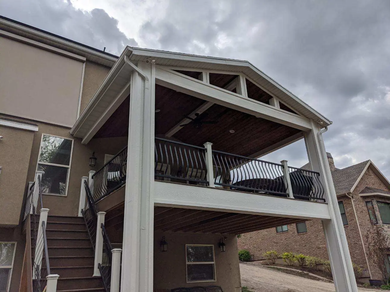 Custom Stick Frame Gable Roof Transform an outdoor space with custom outdoor deck roofing! We specialize in providing a seamless blend between the house and new structure. This is a custom stick frame gable roof.