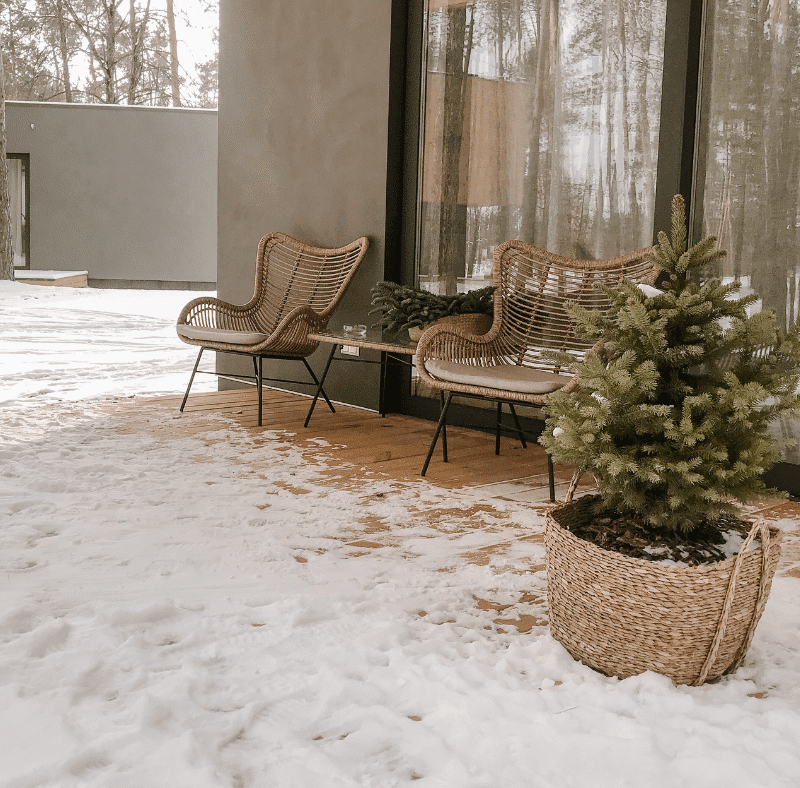 composite deck featuring chairs and holiday decorations