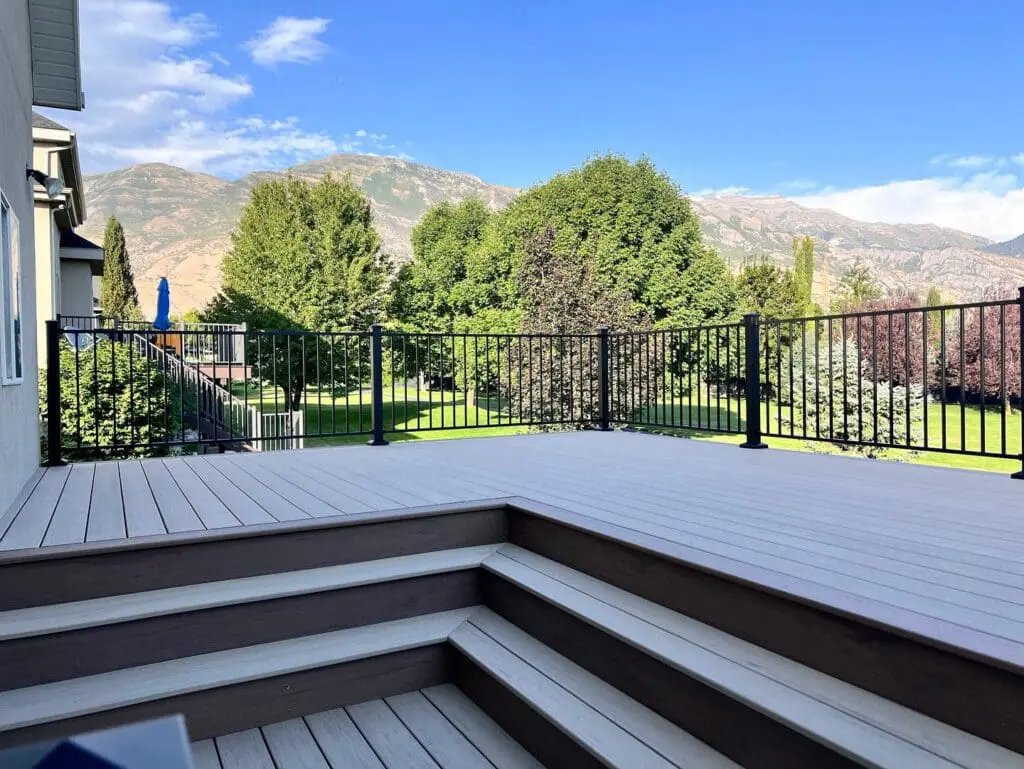 composite Deck and railing by Blackrock decks that have various levels and steps. Multilevel spaces are considered part of the deck trends in 2026!