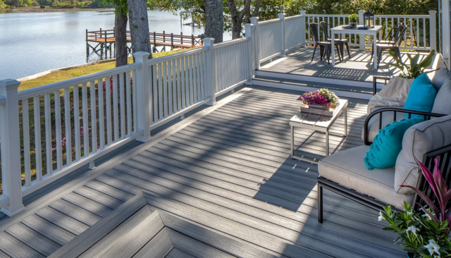 Composite deck with safety railing overlooking a lake