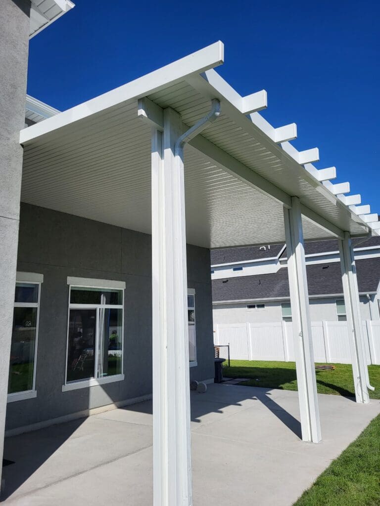 custom patio cover on back patio of a Utah home 