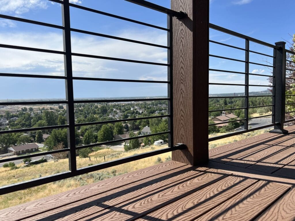 Horizontal steek deck railing featuring the Utah skyline